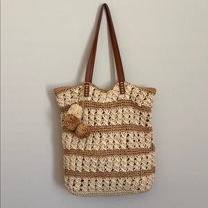 Neutral Straw Tote with Brown Trim and Pom-Pom Accents